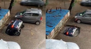 Chiếc ô tô Hyundai đang đỗ rơi xuống 'hố tử thần' rồi chìm nghỉm khiến người xem rùng mình